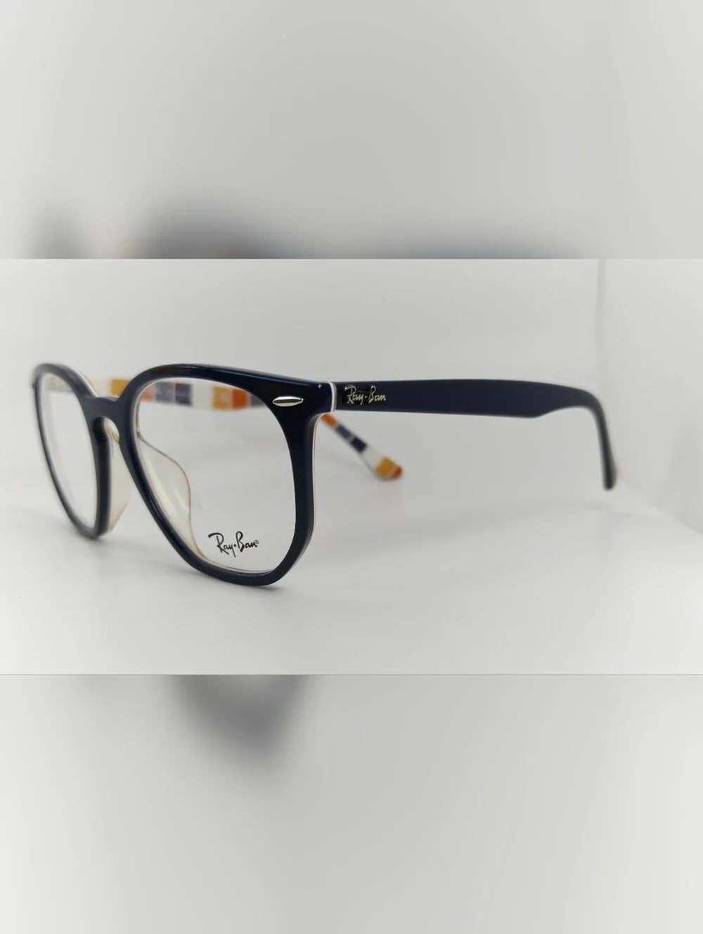 RB 7151R Ray-Ban Navy Blue Round Full-Rim Optical Frames.
